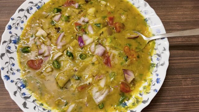 indian street food dal chaat with chopped onion tomato green chili served in plate