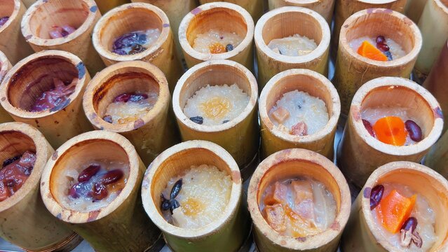 Thai Bamboo Sticky Rice Dessert Khao Lam, Coconut Milk Glutinous Rice with Beans in Bamboo Tube