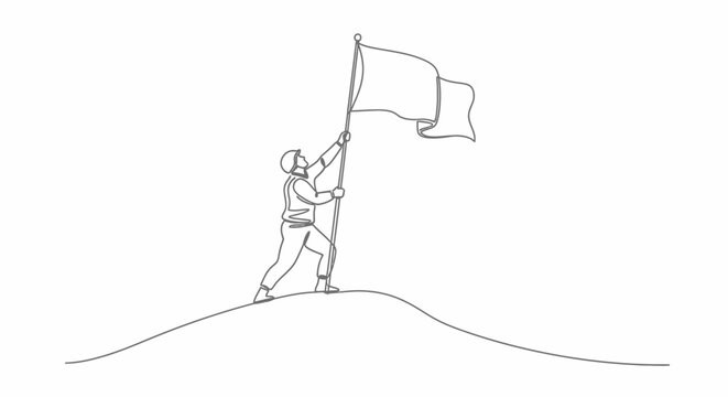 Man standing on hill with flag.