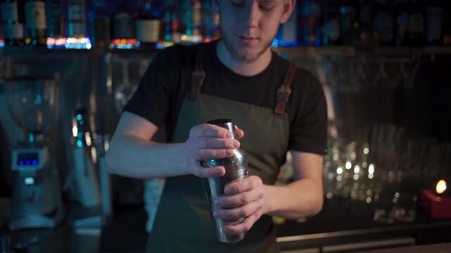 hipster barista preparing luxury espresso martini cocktail in night club, stylish barman mixing cocktail with coffee and vodka 4k