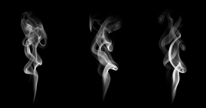 Set of white smoke swirls isolated on black background with smooth flowing shapes and abstract vapor texture, ideal for overlay effects, fog design elements, and creative atmospheric visuals