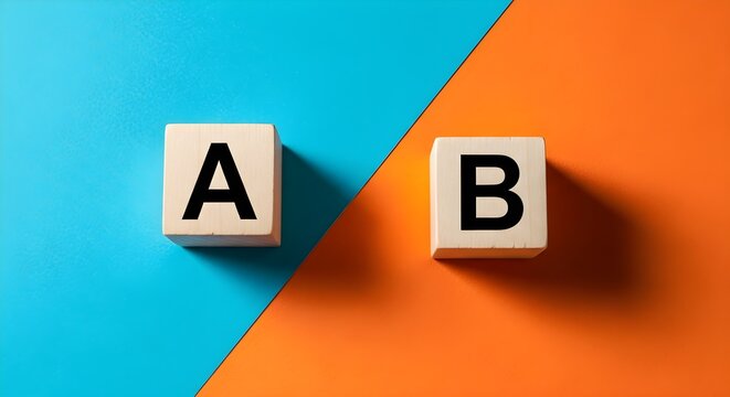 Abstract image showing wooden blocks with letters A and B on a split orange and blue background