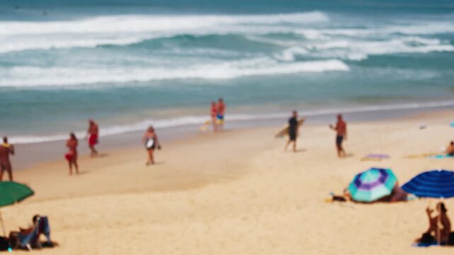 People walk on the beach in Brazil
