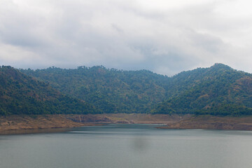 Fototapeta premium Panoramic Reservoir View Low Water Level Forested Hills Khun Dan Prakarnchon Dam Nakhon Nayok Thailand