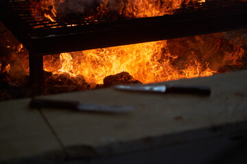 Obraz premium Burning fire pit used for roasting lamb during Samaritan Passover ritual