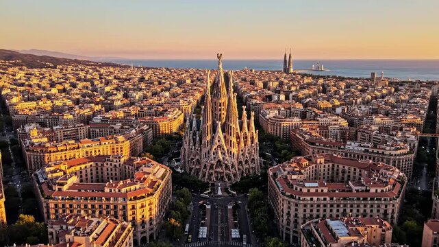 Stunning Aerial View of Barcelona Sagrada Familia Basilica at Golden Hour Sunset for Travel Documentaries and Tourism Marketing.