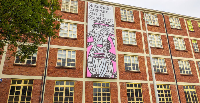 Brick building with a large banner for a national museum in Turnhout, Belgium