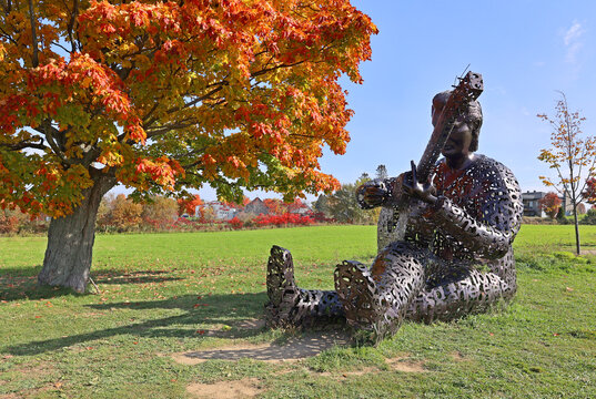 SAINT-PIERRE-DE-L'ILE-D'ORLEANS QUEBEC CANADA: Felix Leclerc statue, Giant Metal Sculpture was a French-Canadian singer-songwriter, poet, writer, actor and Qu&eacute;b&eacute;cois political activist.
