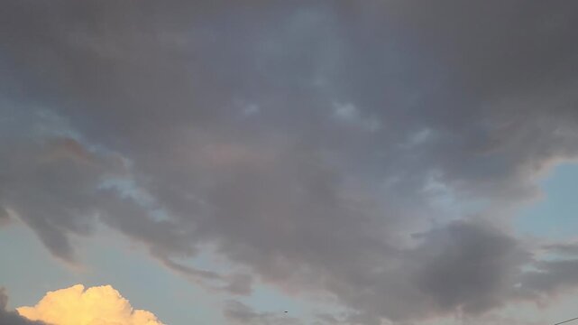 Dramatic Evening Sky with Golden Illuminated Clouds