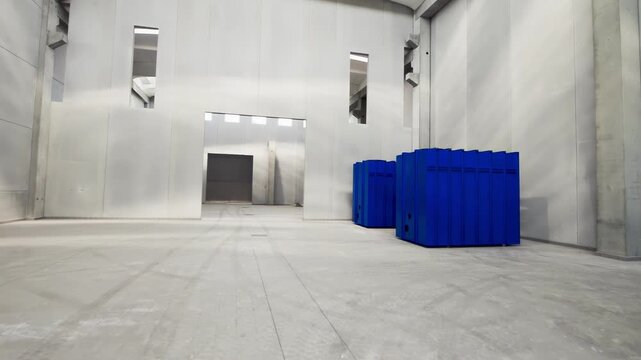 Construction materials arranged on site for ongoing building and infrastructure development with organized storage zones