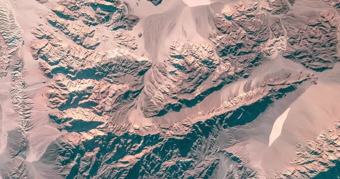 Panoramic top view of sandy mountains with prints of erosion in desert. Camera is moving forward and left. Animation based on image by NASA