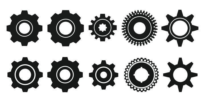 Collection of black gear with varying teeth and inner circles cogwheel mechanical machinery