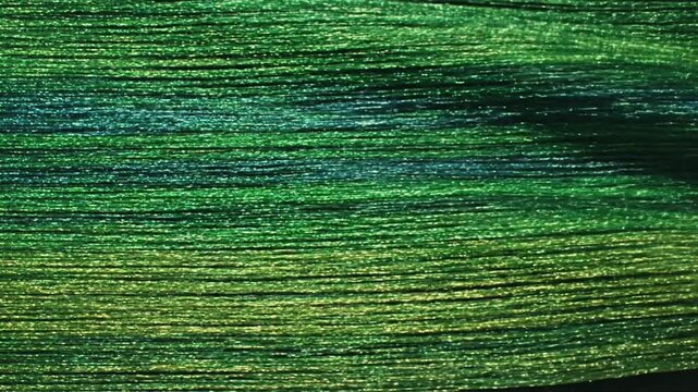 Abstract green and blue textile texture with horizontal lines