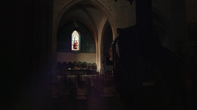 Issigeac Church Stained Glass and Atmospheric Light Rays