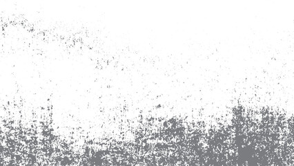 Fototapeta premium Grunge wall texture with black and white distressed brush marks and vintage weathered artistic appearance. Distressed abstract texture featuring rough black paint strokes. 
