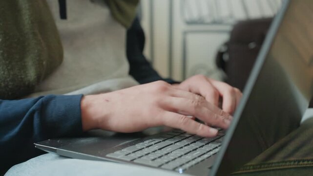 White hands typing on laptop keyboard, closeup of fingertips tapping keys, denim sleeve and coffee hint, rhythmic keystrokes during coding and editing sessions, concentrated flow and ergonomic focus