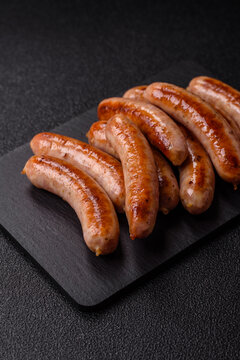 Grilled or barbecued chicken sausages for the dinner table. Grilled sausages