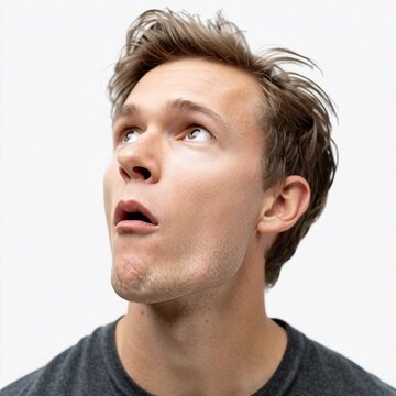 Surprised man expressing shock and disbelief.