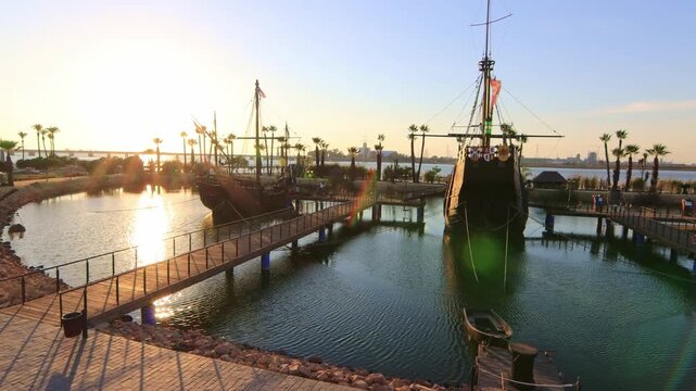 Historic Columbus caravels Santa Maria, Pinta, and Nina at golden hour. Ideal for history, travel, and education themes. Cinematic heritage stock footage.