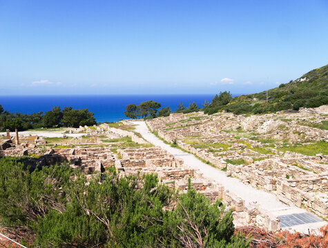 Ancient  Kamiros, Rhodes, Greece. View of the excavated Doric city set on a hillside above the Aegean.  One of the three city states of the island. Well preserved classical city.