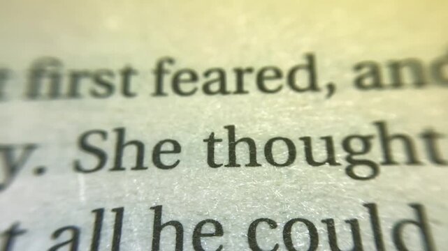 Close Up Video Clip of Text on Paper with Focus Shifts