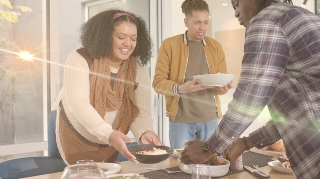 Three friends arriving placing bowls and serving shared meal at table animated tags following hands