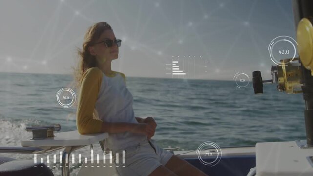 Teen rider reclining boat wake lifting hair turning tech HUD overlaying view near reel seeing sea