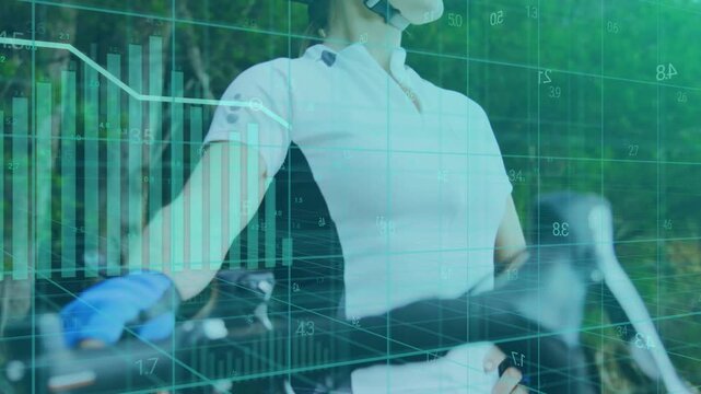 Wearable sensors sending data, cyclist gripping bars while charts over body highlighting fitness