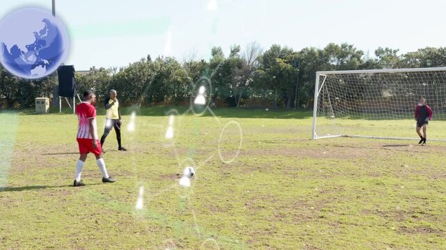 Kicker placing ball running and kicking in soccer practice goalkeeper diving globe or user overlayin