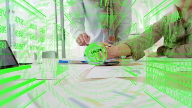 Standing lead pointing activating business data overlay centering pen while team reaching consensus