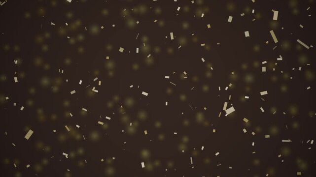 Golden metallic confetti falling seamlessly on a dark background for party concepts