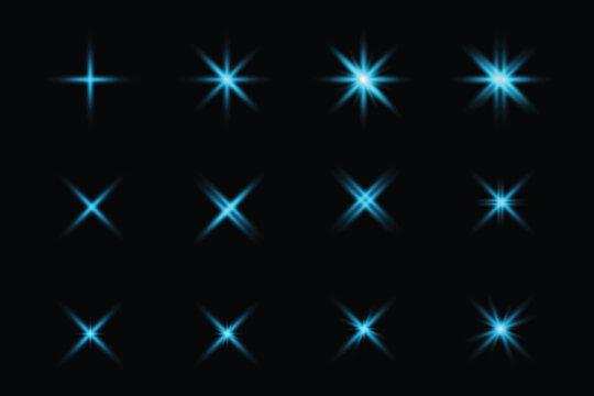 A Collection of sparkling bright blue light flares and starbursts on a black background