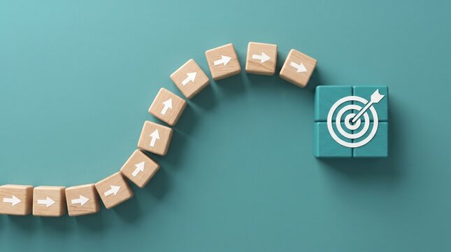 Wooden blocks with arrow icons leading to a blue target block on pastel green background. Business strategy, goal setting, direction, focus and success concept.