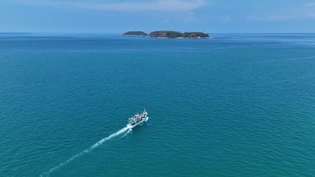 Sailing Adventure Small Boat Journeys Across Vast Blue Ocean Towards Distant Island on Horizon Under Clear Sky
