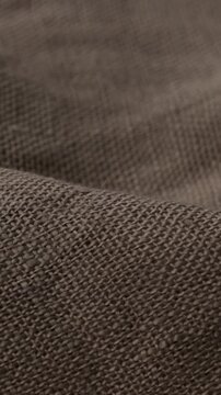 dark fabric natural textile background cotton or linnen vertical video
