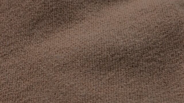 knitted brow of textile woollen rotation fabric background