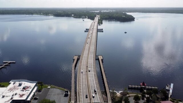 Drone shot looking at the bridge into downtown Palatka from a distance