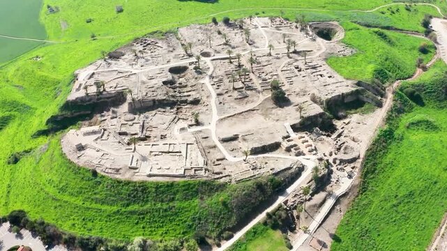 Aerial Cinematic View of Ancient Roman Ruins and Archaeological Excavations at Tel Beit She'an shot with Drone