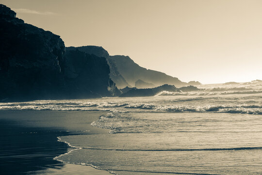 Scenic view of Odeceixe Beach (Praia de Odeceixe) at sunset, Alentejo/Algarve border, Portugal.