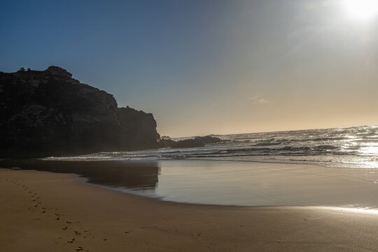 Scenic view of Odeceixe Beach (Praia de Odeceixe) at sunset, Alentejo/Algarve border, Portugal.