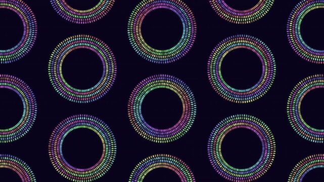 Colorful dotted ring circles repeat across a dark background in an abstract geometric pattern, ideal for modern tech visuals, music events, digital backdrops, and VJ screens
