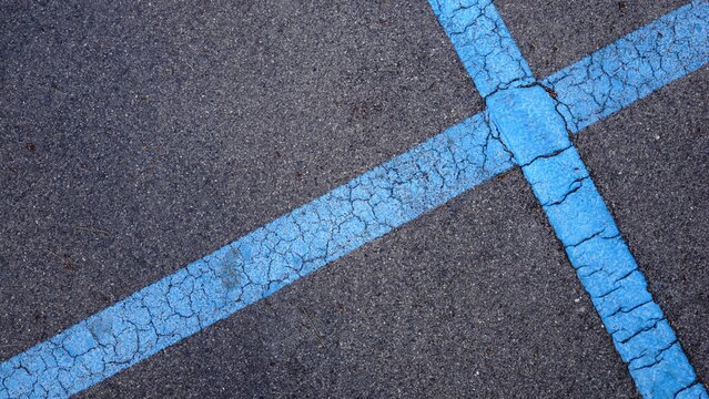 blue parking lines on asphalt