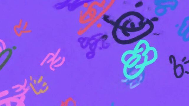 Abstract colorful hand drawn scribbles on a vibrant purple background