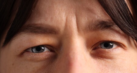 Fototapeta premium Macro view of woman with beautiful eyes