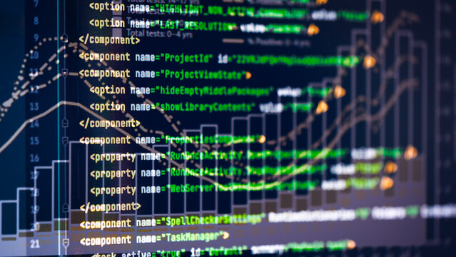 Code lines glow green against dark background. Graphs rise and fall, showing data trends visually. Developer workspaces reflect digital innovation and precision. Ideal for tech, coding