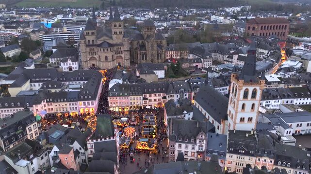 New Year in Trier, Germany. Trierer Weihnachtsmarkt, Aerial view of Hauptmarkt, Cathedral of Trier and Christmas market.
