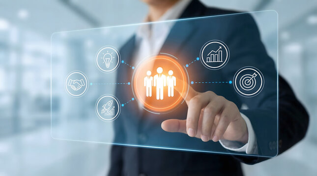 Businessman interacts with virtual interface touching human icon representing teamwork and communication in a professional setting with technology