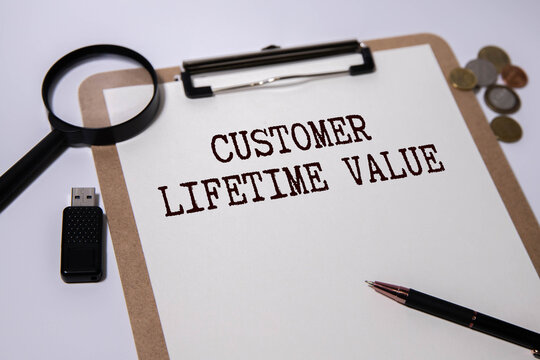 CLV customer lifetime value, words on cut paper hard light