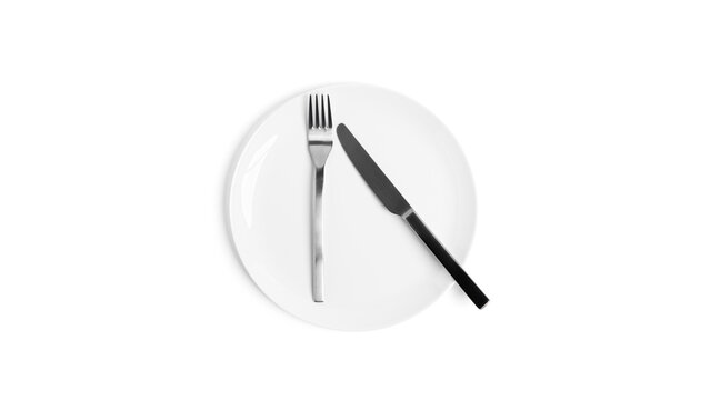 Sign language with cutlery. A plate with cutlery isolated on a white background. Plate, knife, fork on a white background.