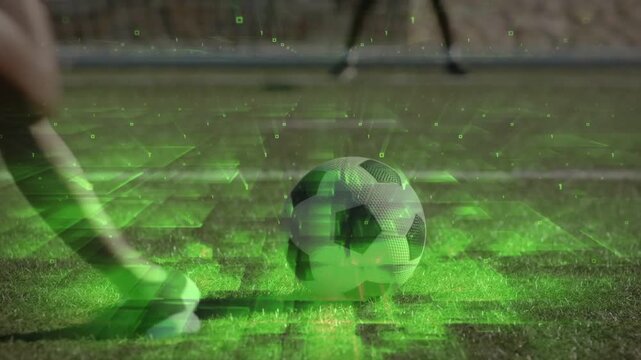 Soccer shooter's foot contacting ball, kicking to score while keeper diving, green overlay guiding